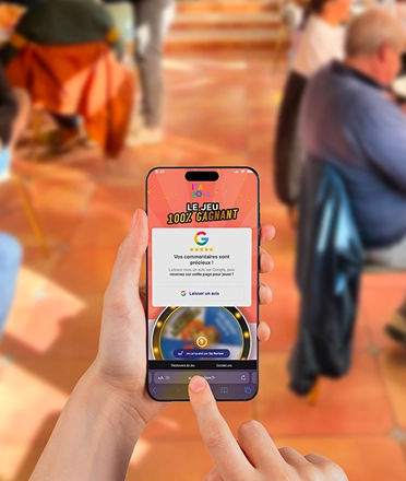 Customer taking part in Italova's Up Review prize game on her smartphone in the dining room